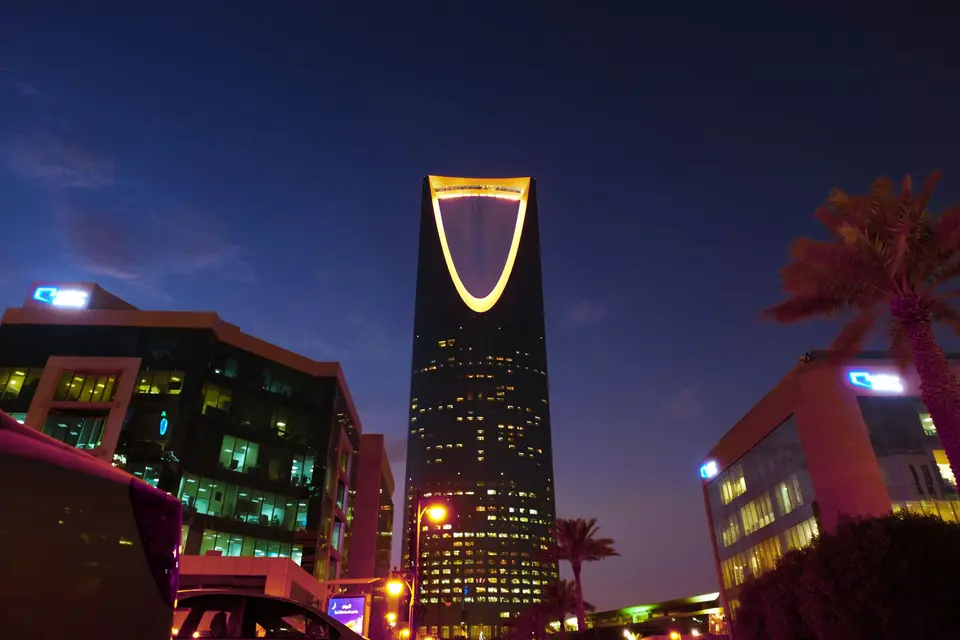 Kingdom Centre Tower illuminated at twilight in Riyadh